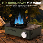 FlameGuard Ranger portable stove burning a blue flame outdoors with wind-shielded recessed burner
